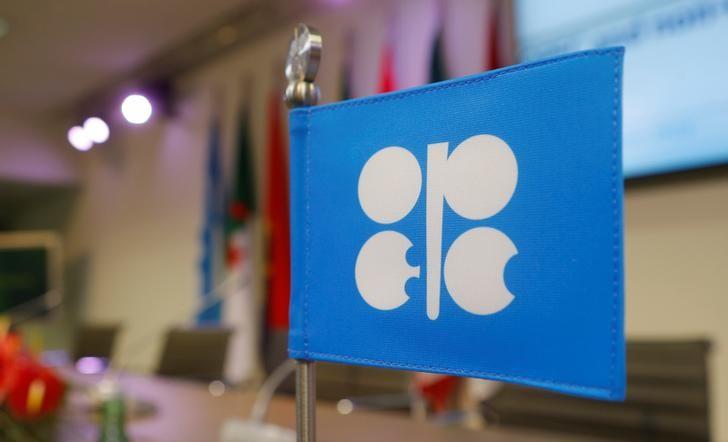 A flag with the Organization of the Petroleum Exporting Countries (OPEC) logo is seen before a news conference at OPEC's headquarters in Vienna, Austria December 10, 2016. REUTERS/Heinz-Peter Bader