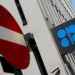 OPEC December oil output slips, still near record