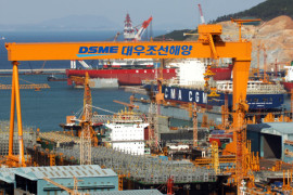 Ships are under construction at the Daewoo Shipbuilding & Marine Engineering Co. (DSME) shipyard in Geoje, South Korea, on Wednesday, April 22, 2009. Daewoo Shipbuilding & Marine Engineering Co. is the world's third-largest shipyard. Photographer: Seokyong Lee/Bloomberg News