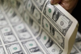 Cédulas de dólar mostradas em Washington. 14/11/2014.   REUTERS/Gary Cameron