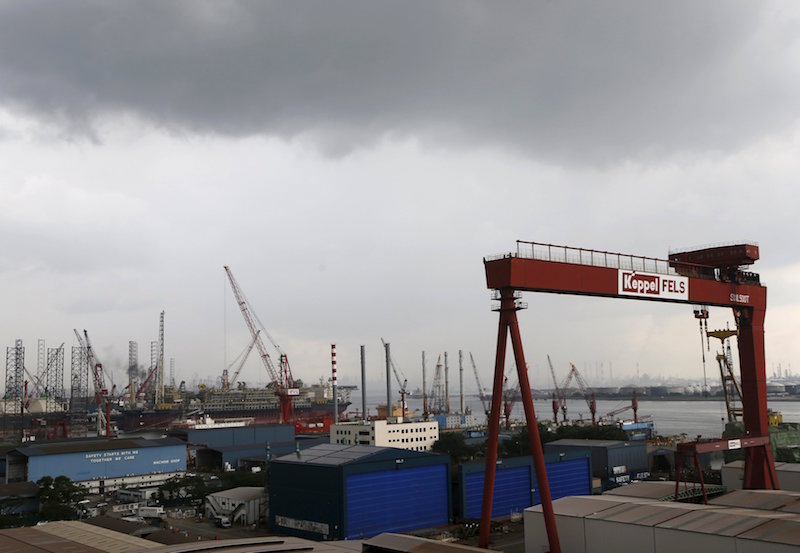 A view of a Keppel Corporation shipyard in Singapore January 19, 2016. Singapore's Keppel Corporation Ltd KPLM.SI said on Thursday its fourth-quarter net profit fell 44 percent and its 2015 profit dropped to a five-year low as plunging oil prices hit demand for offshore rigs. Picture taken January 19, 2016.   REUTERS/Edgar Su